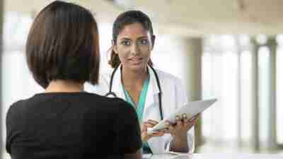 A doctor consults with a patient about the possibility of adult ADHD.