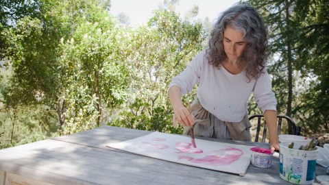 Women artist with adhd, painting
