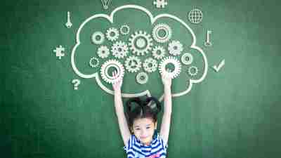 School girl kid student with cloud computing mind, smart brain imagination doodle on chalkboard for science technology education, children psychology and mental health awareness concept