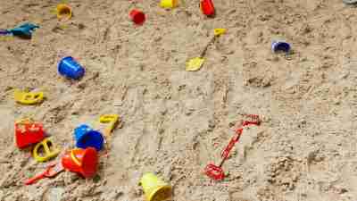 Unclear Diagnosis: Buckets & Pails Scattered In Sandbox