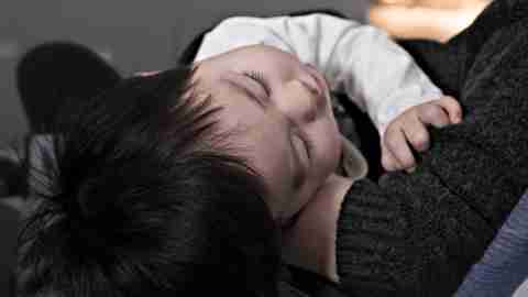 Positive Parenting Strategies: Child in Mother's Arms