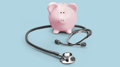 A piggy bank and stethoscope representing ADHD treatment costs